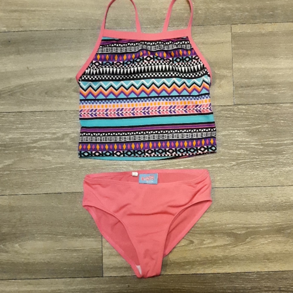 2 piece  swim suit. Size M (7/8)